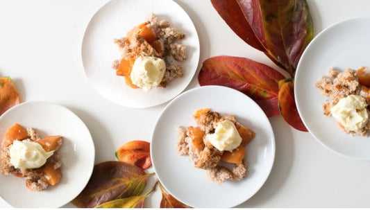 HONEY BAKED PERSIMMONS WITH COCONUT CRUMBLE AND GINGER MASCARPONE